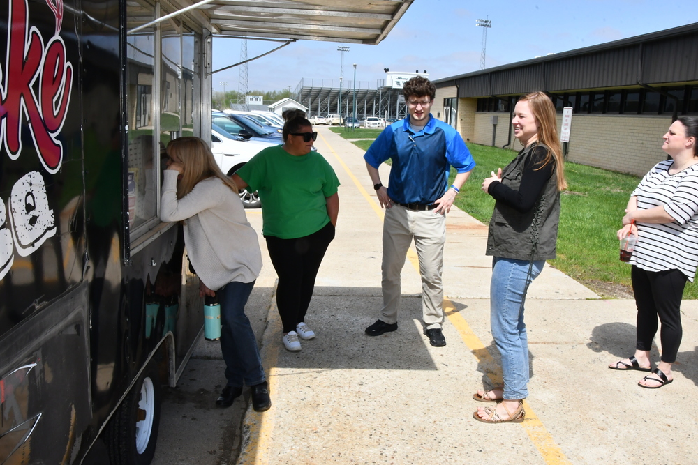 photo of teachers waiting for food truck food